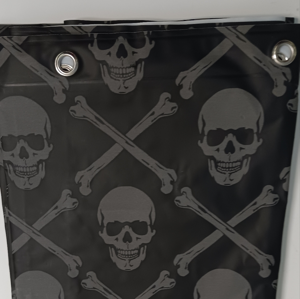 Shower liner black with gray skulls and crossbones print